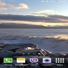 Além do papel de parede animado para Android Relógio musical , baixar do arquivo apk gratuito da imagem de fundo Ondas nas rochas .